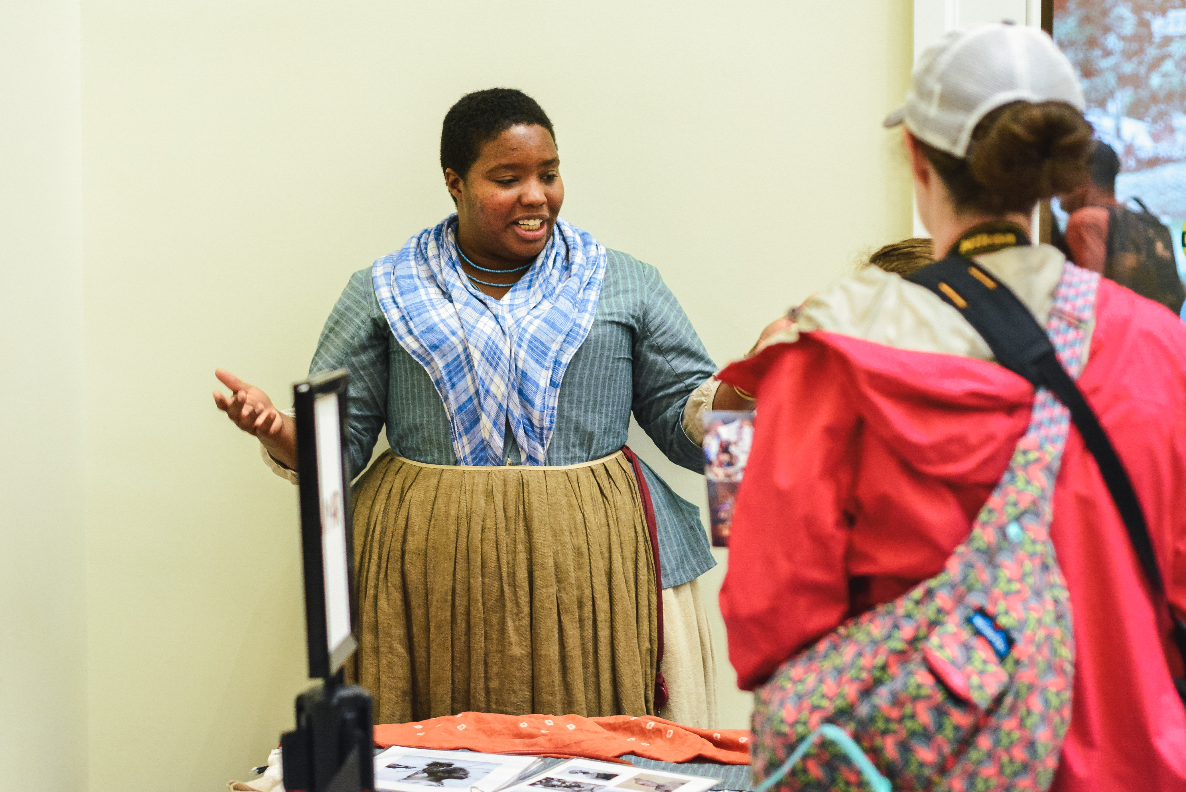 Cheyney Mcknight interacts with Museum guests as part of 2019 Meet The Revolution programming.