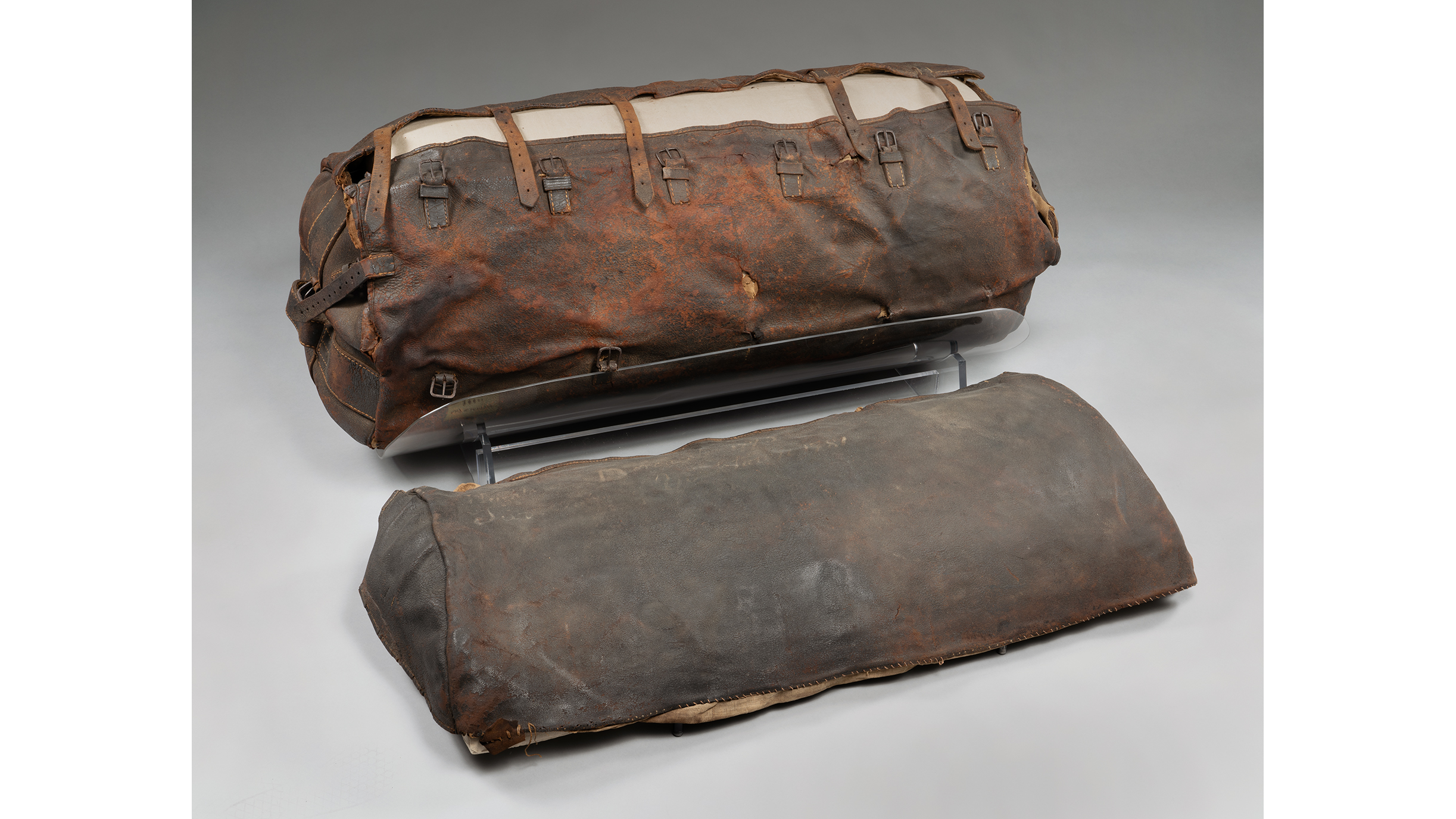 Large weathered leather bag, or portmanteau, used to carry George Washington's belongings during the Revolutionary War.