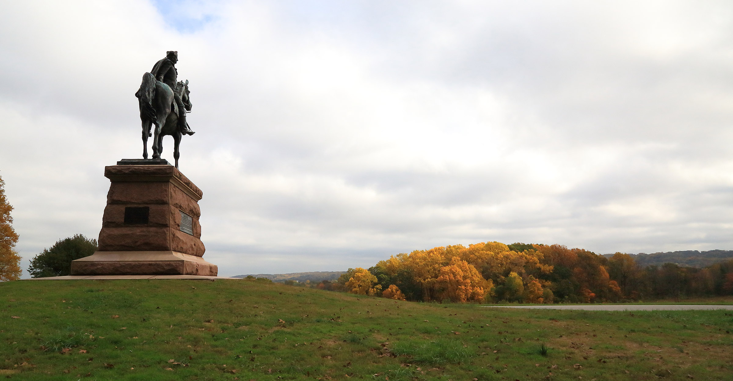 This image is of a statue of General Anthony Wayne riding a horse located in an open field in Valley Forge National Historical Park.