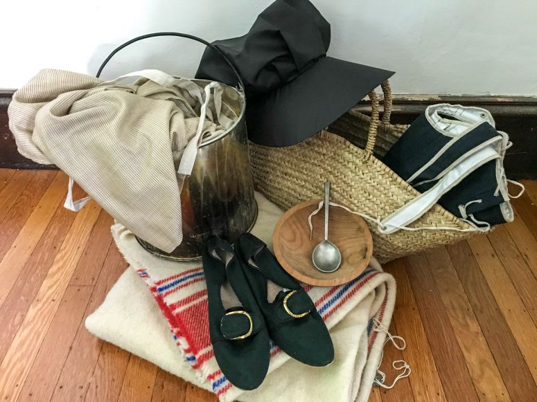 Replica handling objects from the camp followers discovery cart