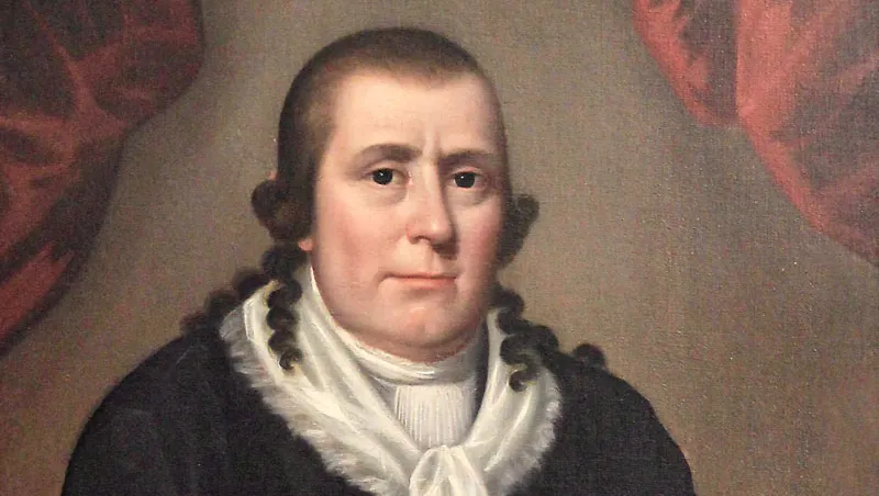 A portrait of the Public Universal Friend. They have dark hair with long, curled sides, and are dressed in black with a white collar.