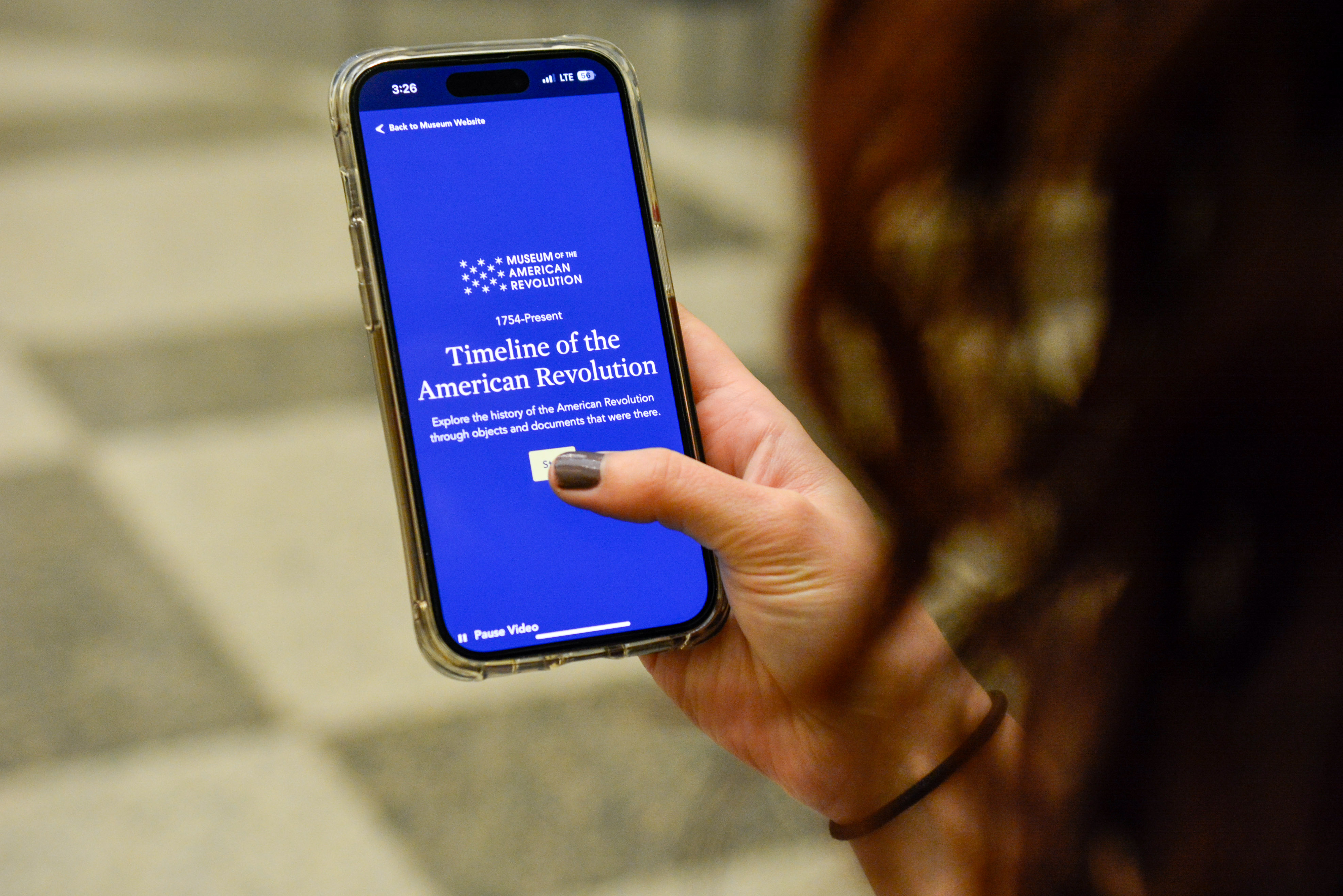 A user goes to click start on the their phone to explore the Timeline of the American Revolution.
